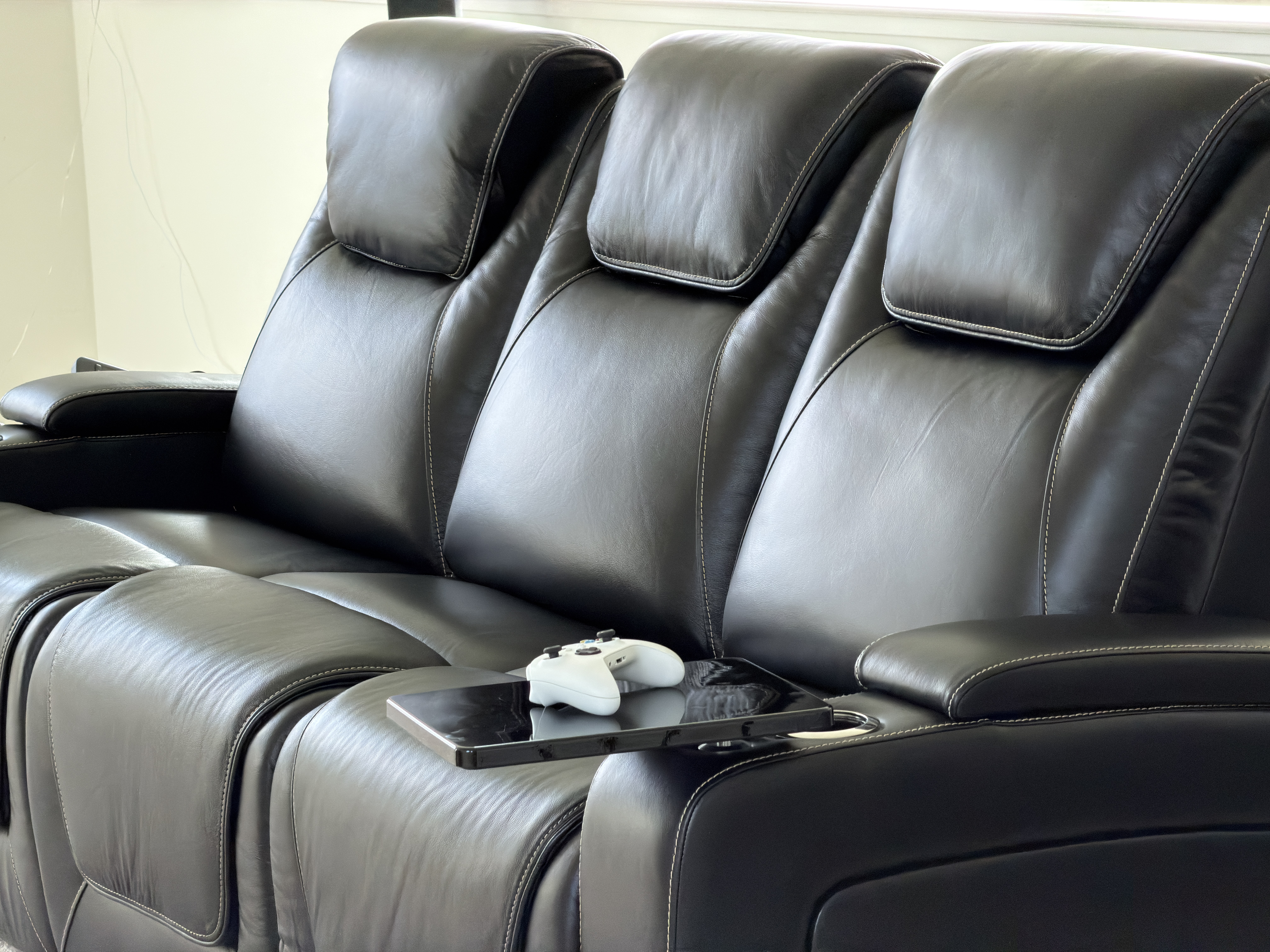 Seatcraft theater chairs with diamond quilting and LED cupholders